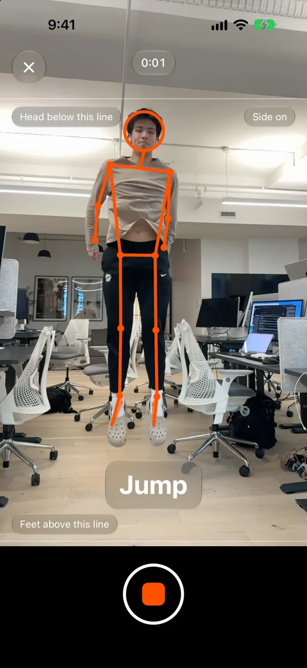Vert filming a jump, the live pose skeleton drawn on the athlete in the air
